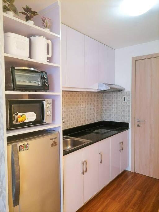 Cozy Studio Unit At Sun Residences Кесон Сити Екстериор снимка