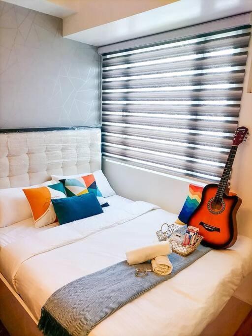 Cozy Studio Unit At Sun Residences Кесон Сити Екстериор снимка